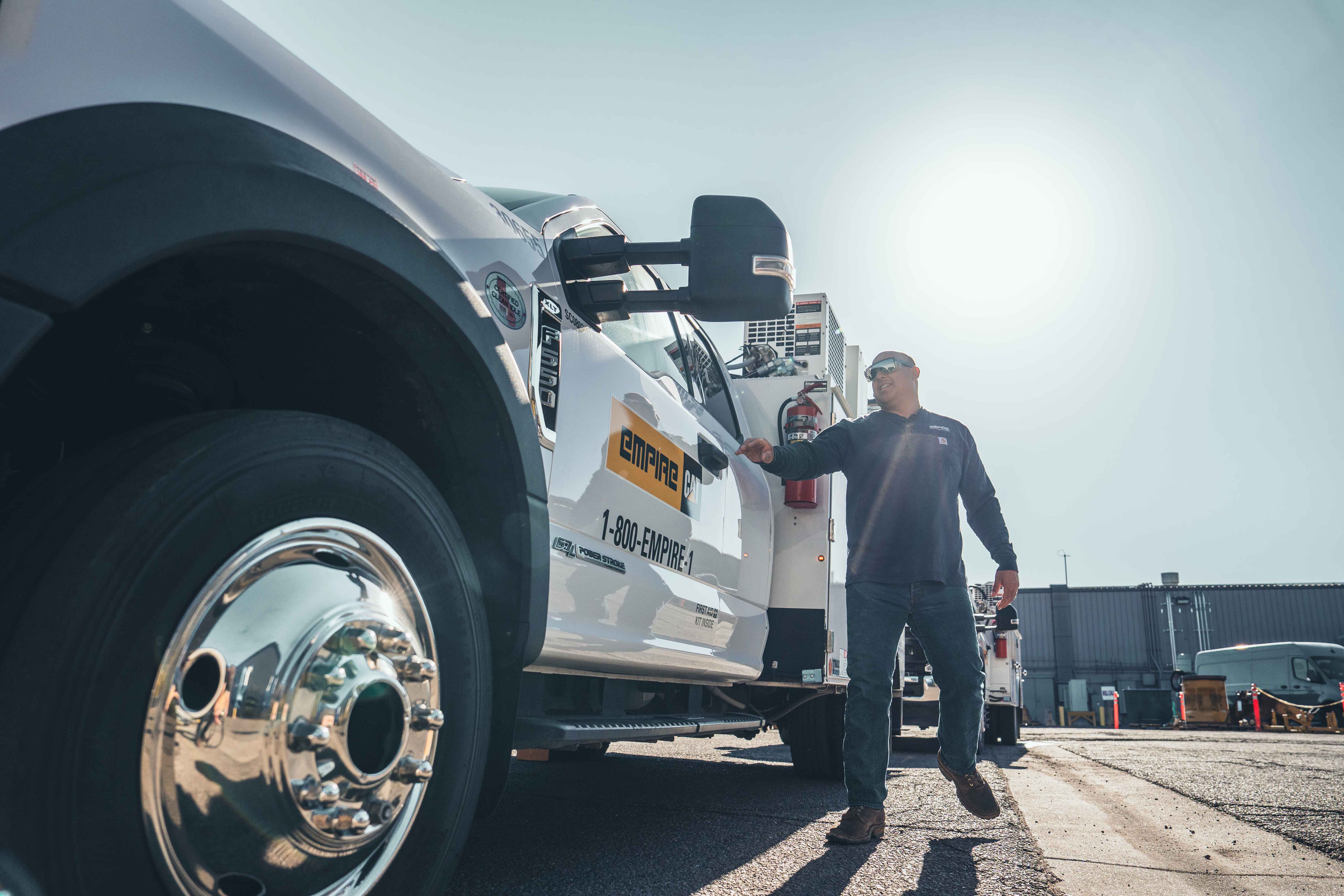 field technician getting into service truck